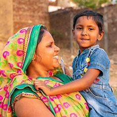 A mother with her son. Read about Beneficiary Designations A mother with her son. Read about Beneficiary Designations