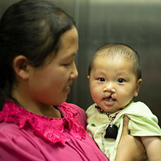 A mother holding her baby. Read about Gifts by Estate Note A mother holding her baby. Read about Gifts by Estate Note