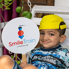 Photo of a boy holding a sign. Link to Life Stage Gift Planner Under Age 60 Situations. Photo of a boy holding a sign. Link to Life Stage Gift Planner Under Age 60 Situations.