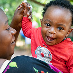 A baby smiling. Read about Gifts from Retirement Plans A baby smiling. Read about Gifts from Retirement Plans